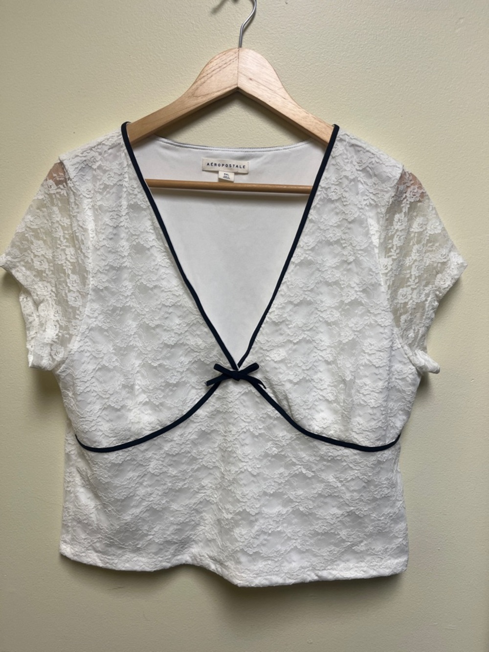 Aeropostale White lace babydoll Top with black bow and trim